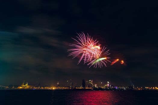 Colored New Year fireworks in centre of Riga