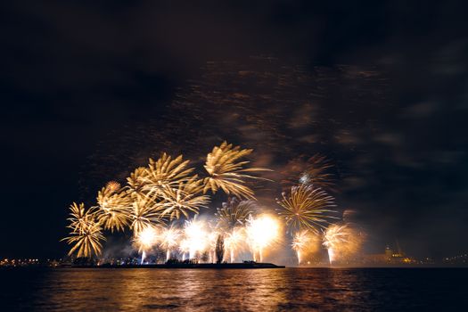 Colored New Year fireworks in centre of Riga