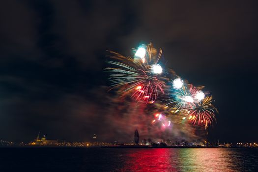 Colored New Year fireworks in centre of Riga