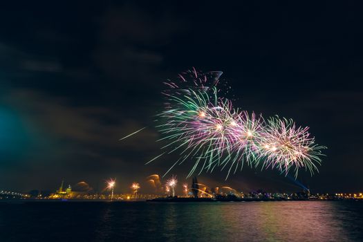 Colored New Year fireworks in centre of Riga