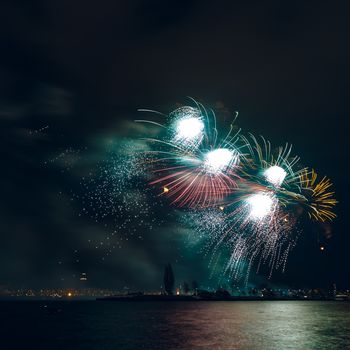 Colored New Year fireworks in centre of Riga