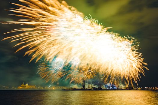 Colored New Year fireworks in centre of Riga