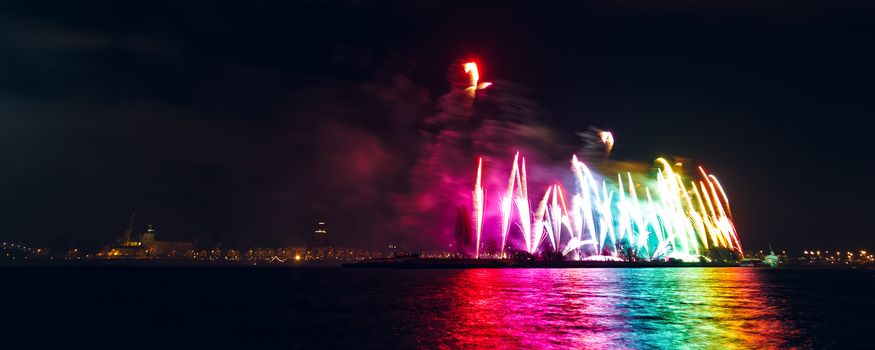 Colored New Year fireworks in centre of Riga