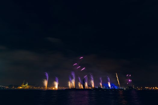 Colored New Year fireworks in centre of Riga