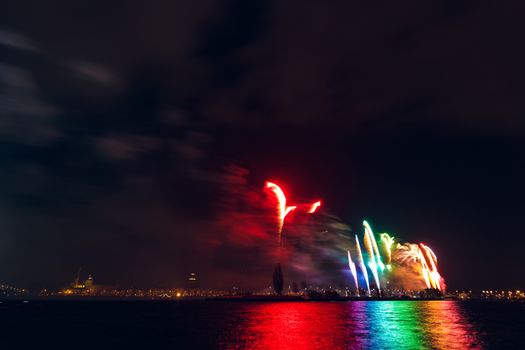 Colored New Year fireworks in centre of Riga