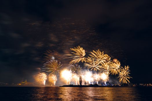 Colored New Year fireworks in centre of Riga