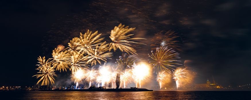 Colored New Year fireworks in centre of Riga