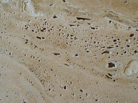 Surface of travertine in close-up as a texture.