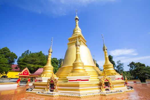 Golden pagoda at Wat Varee Banpot, Wat Bang Non,Ranong Province,Ancient Thai temple, golden pagoda  the beautiful Burmese and thai respect of everyone.