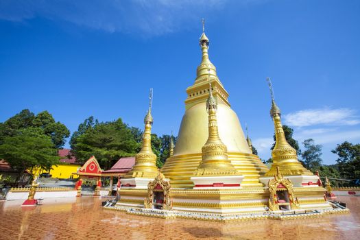 Golden pagoda at Wat Varee Banpot, Wat Bang Non,Ranong Province,Ancient Thai temple, golden pagoda  the beautiful Burmese and thai respect of everyone.