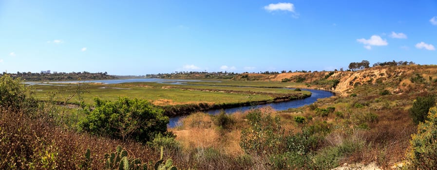 Upper Newport Bay Nature Preserve hiking trail winds along the marsh, where you will see wildlife in Newport Beach, California USA