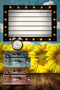 Vintage Light box program board with vintage travel bag and clock at sunflower farm