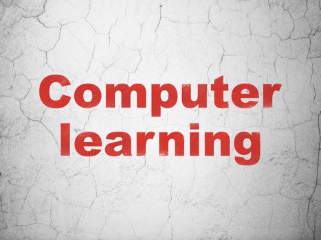 Learning concept: Red Computer Learning on textured concrete wall background