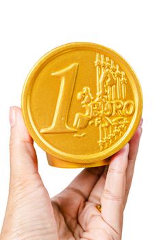 Hand hold Euro coin safe money box isolated on white background, Clipping path.