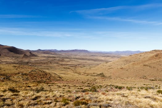 Beautiful Graaff-Reinet view of the green valley within the mountains.