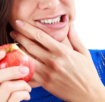 Closeup of woman in strong toothache pain with hands over face. Dental health and care concept. Isolated on white background.