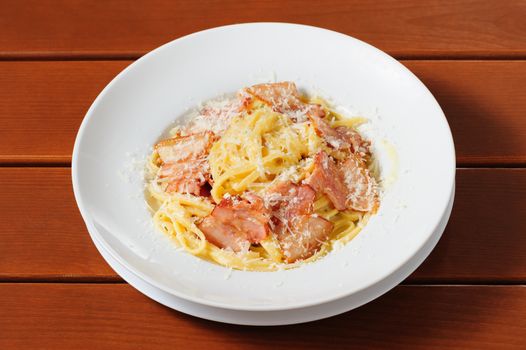 top view tagliatelli carbanara italian cuisine on plate rustic kitchen table background
