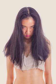 Teenage Asian girl with fierce expression