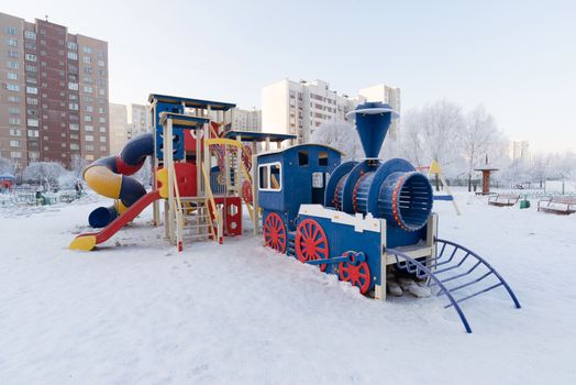 Playground structure outdoors in a winter day