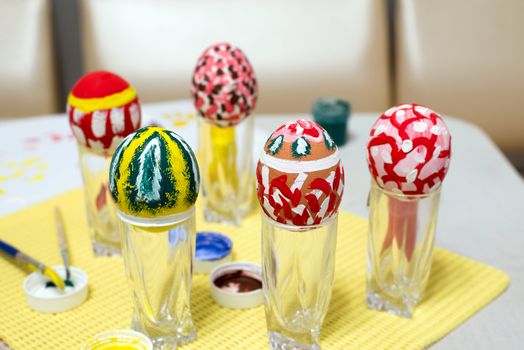 Easter eggs painted by a hand paints