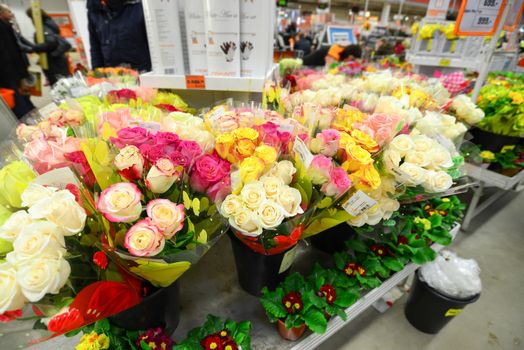 A flower bouquet with a lot of a different flowers