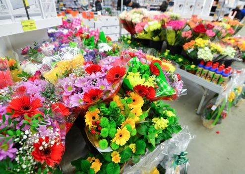 A flower bouquet with a lot of a different flowers