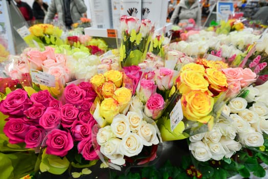 A flower bouquet with a lot of a different flowers