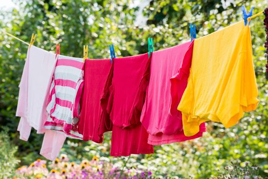 Linen is dried on a rope in the garden