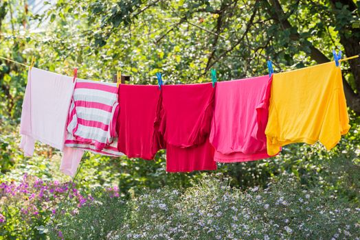 Linen is dried on a rope in the garden