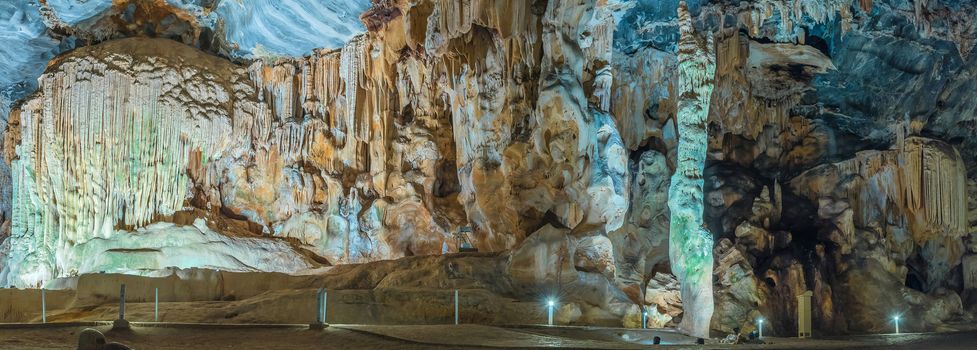 Panorama of the Organ, Cleopatras Needle and other stalagmites and stalactites in the Van Zyl Hall of the Cango Caves. Algae grow on it due to the artificial lighting