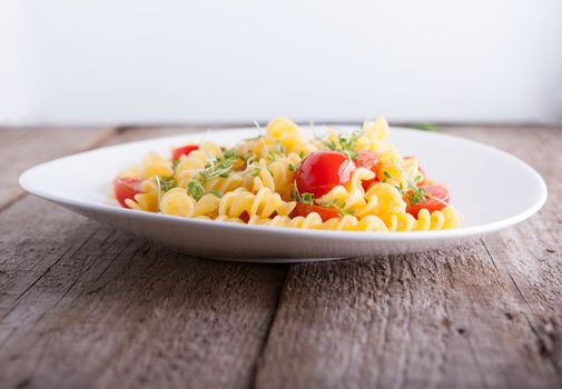 Fussili pasta with watercress and cherry tomatoes