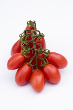 Cherry tomato (plum) of Sicily (Italy) isolated on white background