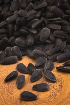 Close-up of sunflower seeds on wooden table