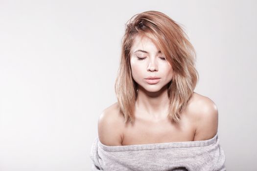 Studio portrait of attractive caucasian girl