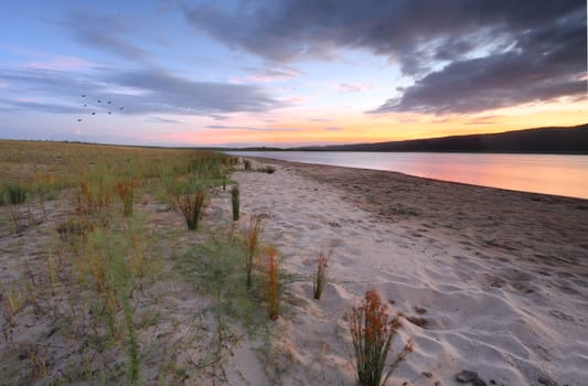 Serene sunset over Boorooberongal, Castlereagh Penrith in low tide