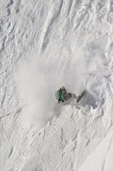 Snowboard freeride. Freerider falling in the mountain