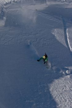 Snowboard freeride. Freerider on the slope of the mountain