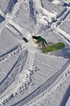 Snowboard freeride. Freerider on the slope of the mountain