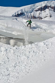 Snowboard freeride. Freerider on the slope of the mountain