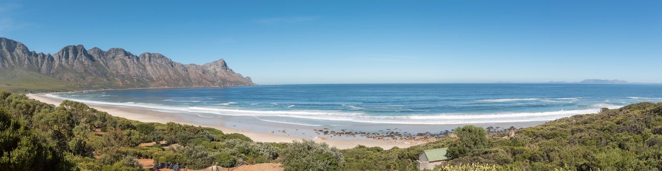 Panoramic view of the coastline on Clarence Drive between Gordons Bay and Rooi-Els. Cape Point is visible across the bay