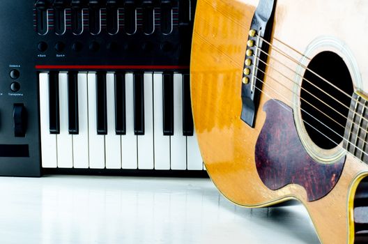 Acoustic guitar keyboard, close-up.