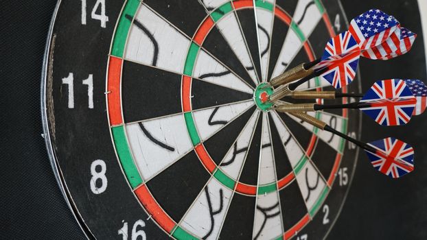Business concept of darts. The target hanged on the wall.