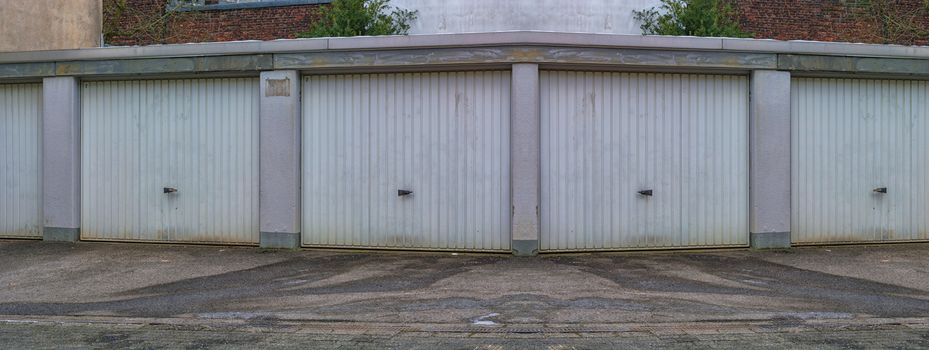 Car rows garages. Car garage with closed gates.