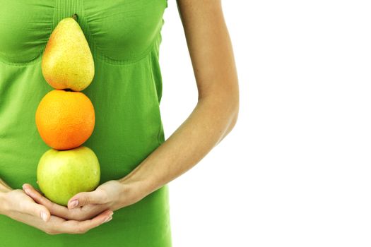 fruit pile in woman hands on white