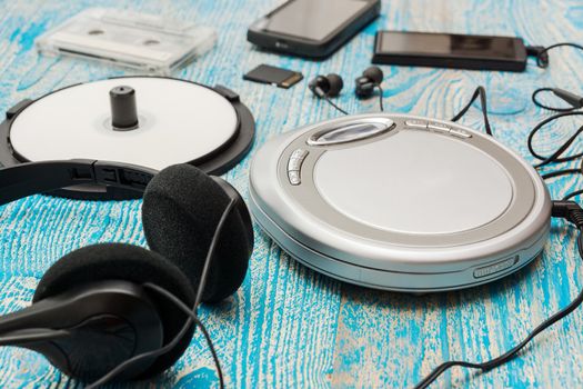 The photo shows a Cd player on a blue background