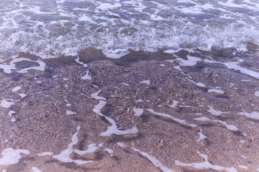 Very clear sea water, you can see the sand