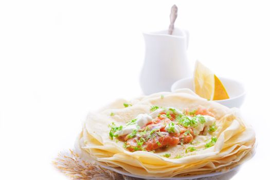 Crispy crepes with smoked salmon  and  cream cheese.