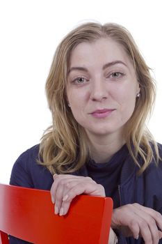 Portrait of a young blond woman on a white background