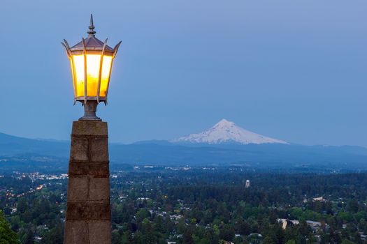 Rocky Butte viewpoint in Portland Oregon with lamp post and Mount Hoods view during evening blue hour