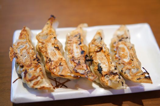 dim sum or gyoza Japanese food on white plate